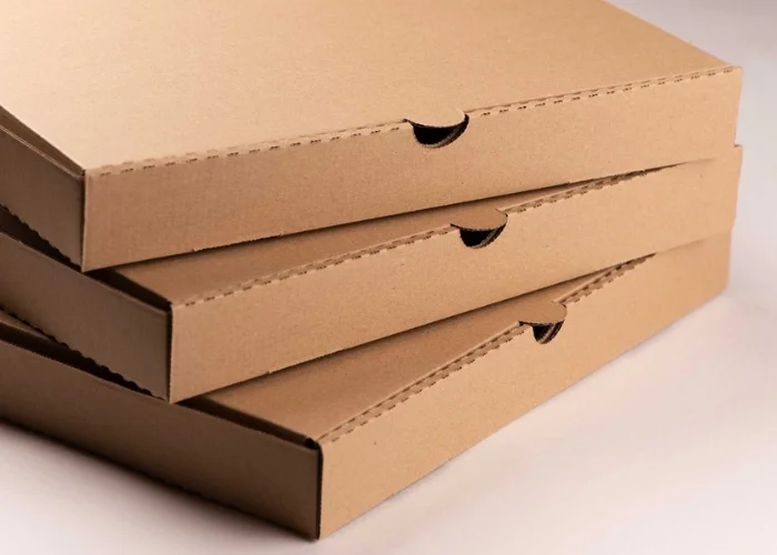 Eco-friendly brown pizza boxes for sustainable packaging solutions.